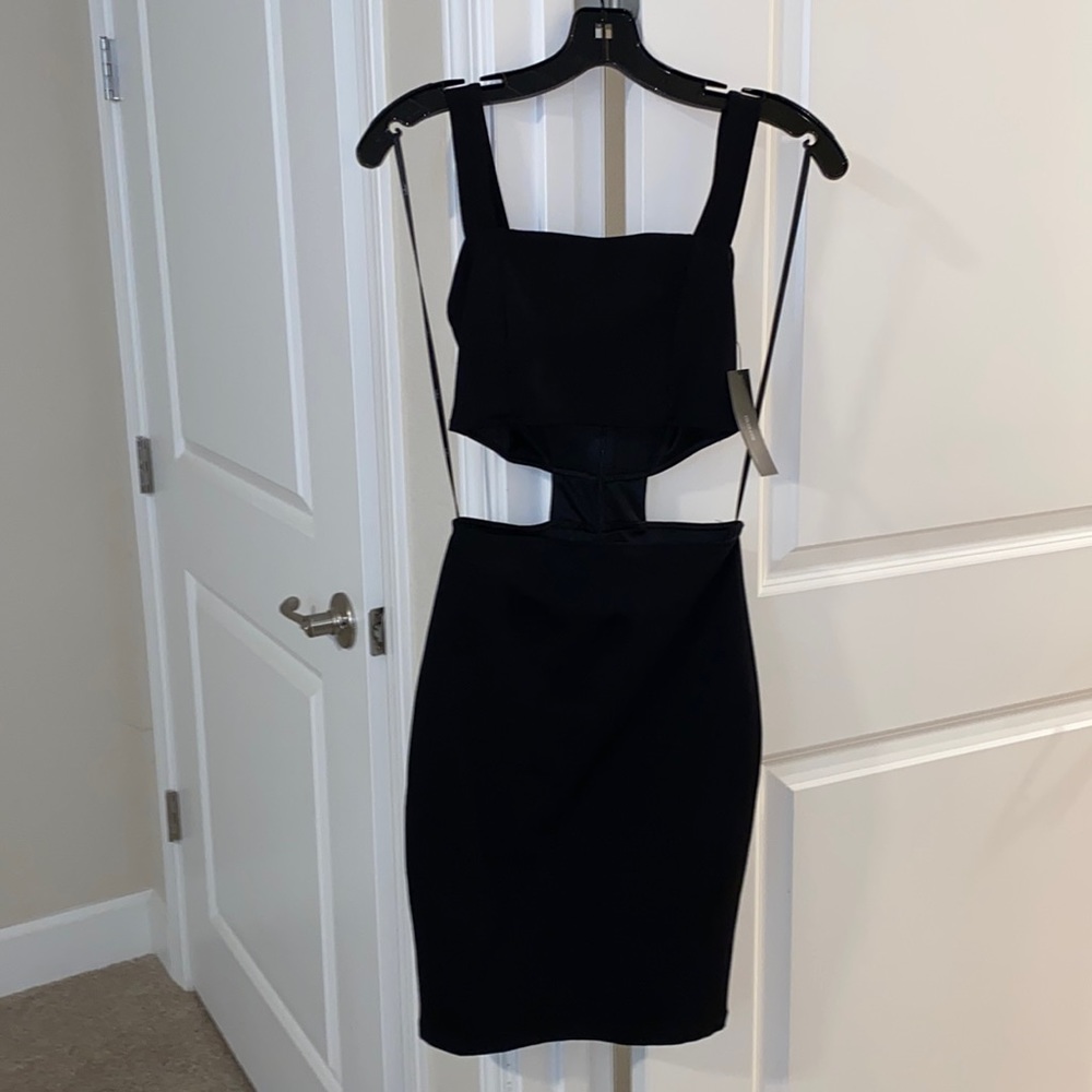 Brand new Lulus dress, XS. One piece but looks like two from front. Tag still on